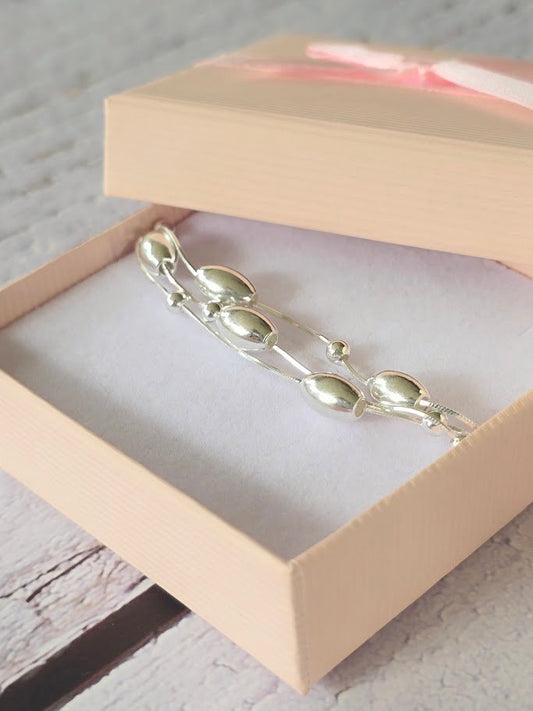 Sterling silver oval bead bracelet, Moving bead bracelet, Silver bead bracelet, Statement jewellery, Elegant jewellery.