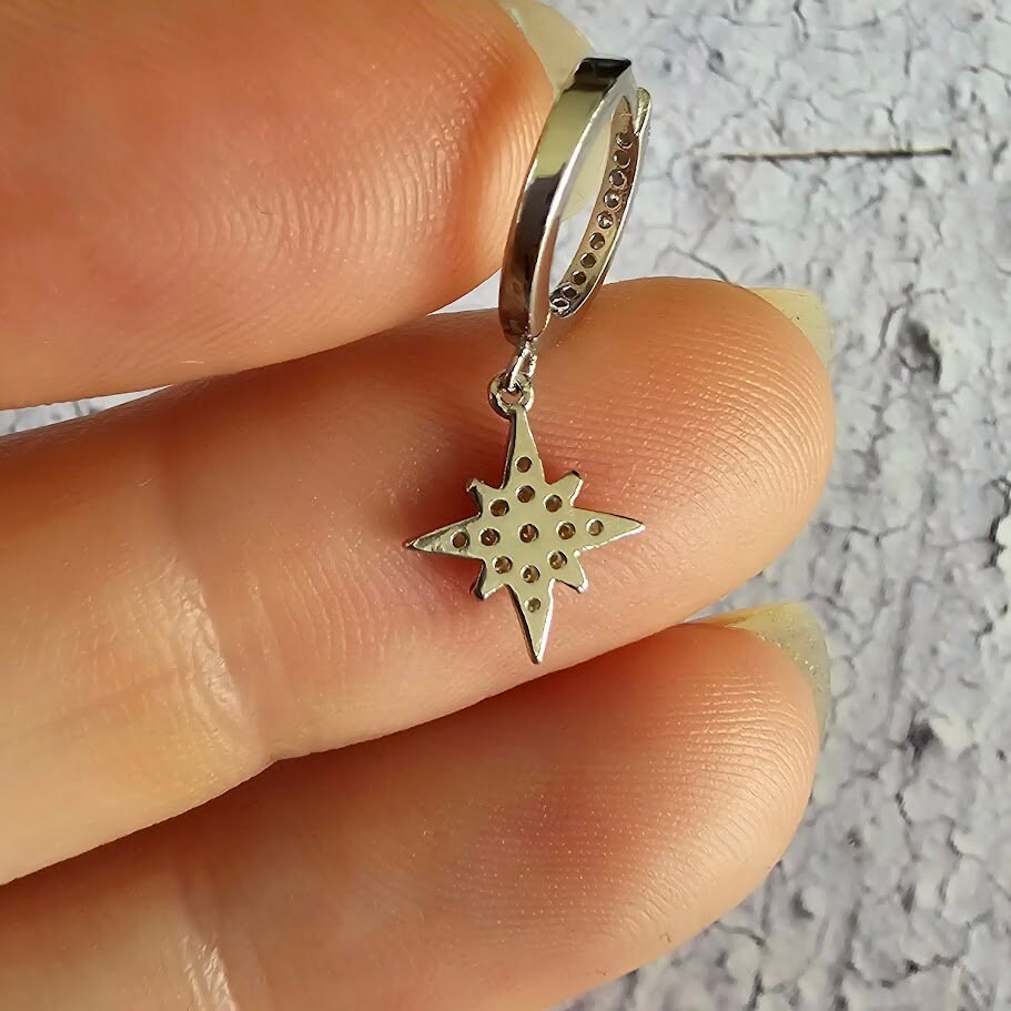 Dainty moon and star asymmetric huggie hoops, cubic zirconia moon and star hoops, sparkly hoops, celestial jewellery, minimalist earrings.