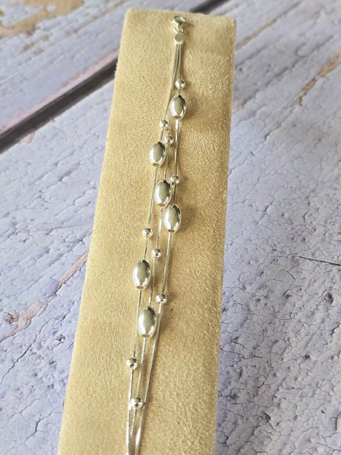 Sterling silver oval bead bracelet, Moving bead bracelet, Silver bead bracelet, Statement jewellery, Elegant jewellery.