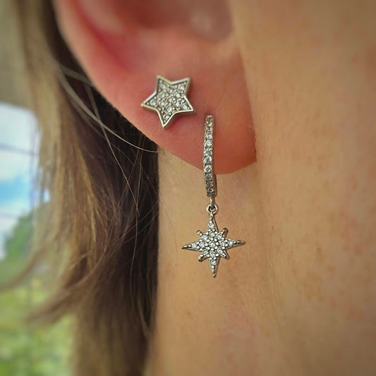 Dainty moon and star asymmetric huggie hoops, cubic zirconia moon and star hoops, sparkly hoops, celestial jewellery, minimalist earrings.