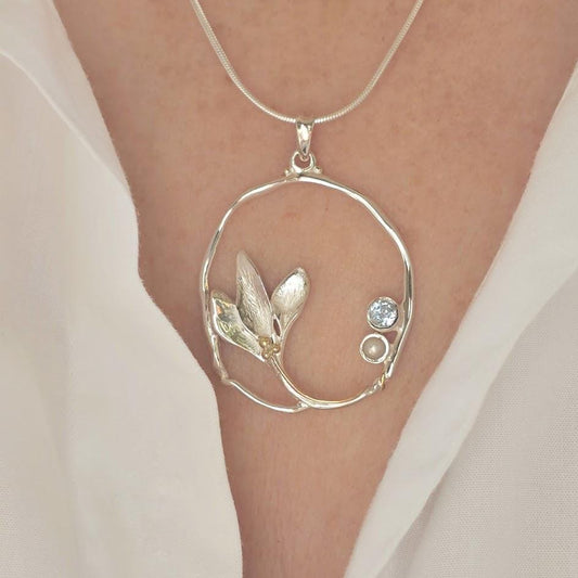 Silver Statement Pendant, Botanical Necklace, Nature Inspired Design, Contemporary Circle Pendant, Blue Topaz and Pearl Necklace